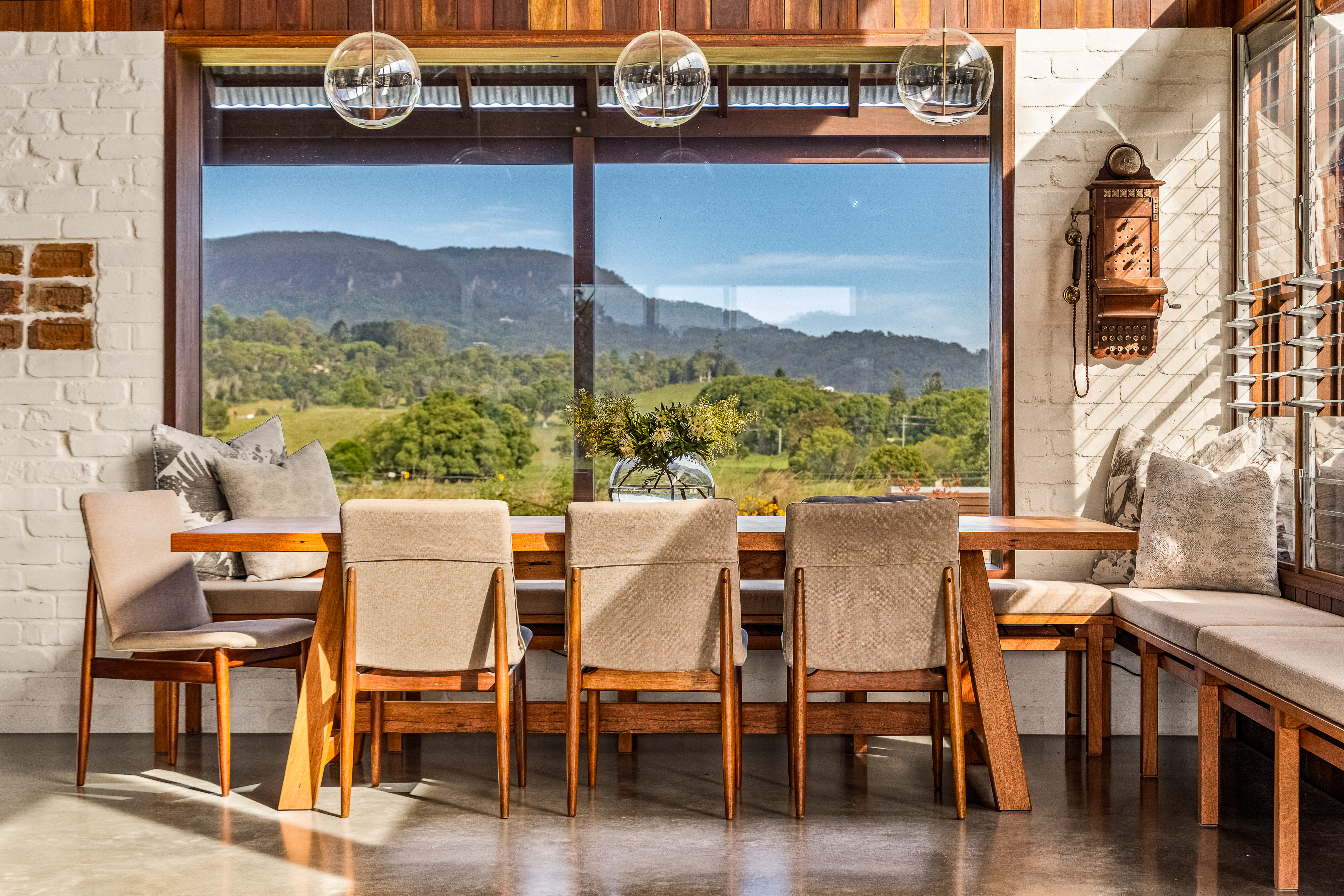 Magnesium plunge pool with sun lounges and mountain views