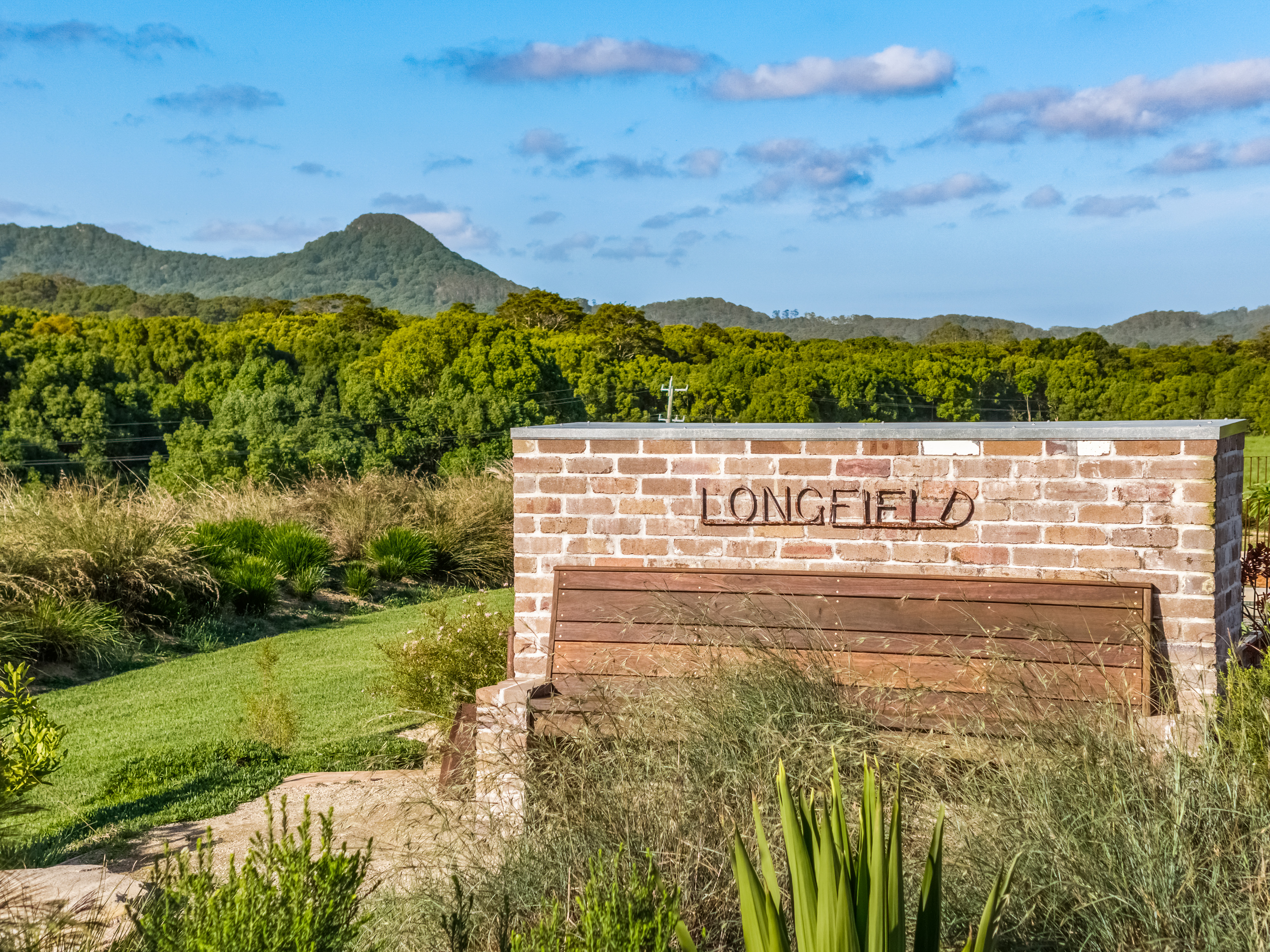 Drone shot of Longfield sign with Mt Chincogan in background