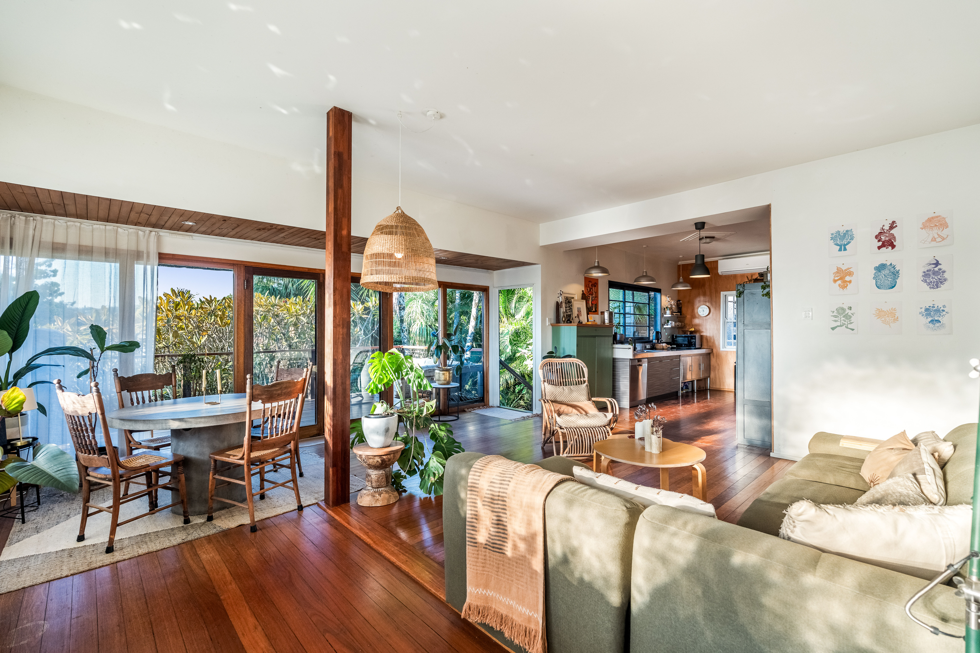 Open plan living and dining with golden sunset light