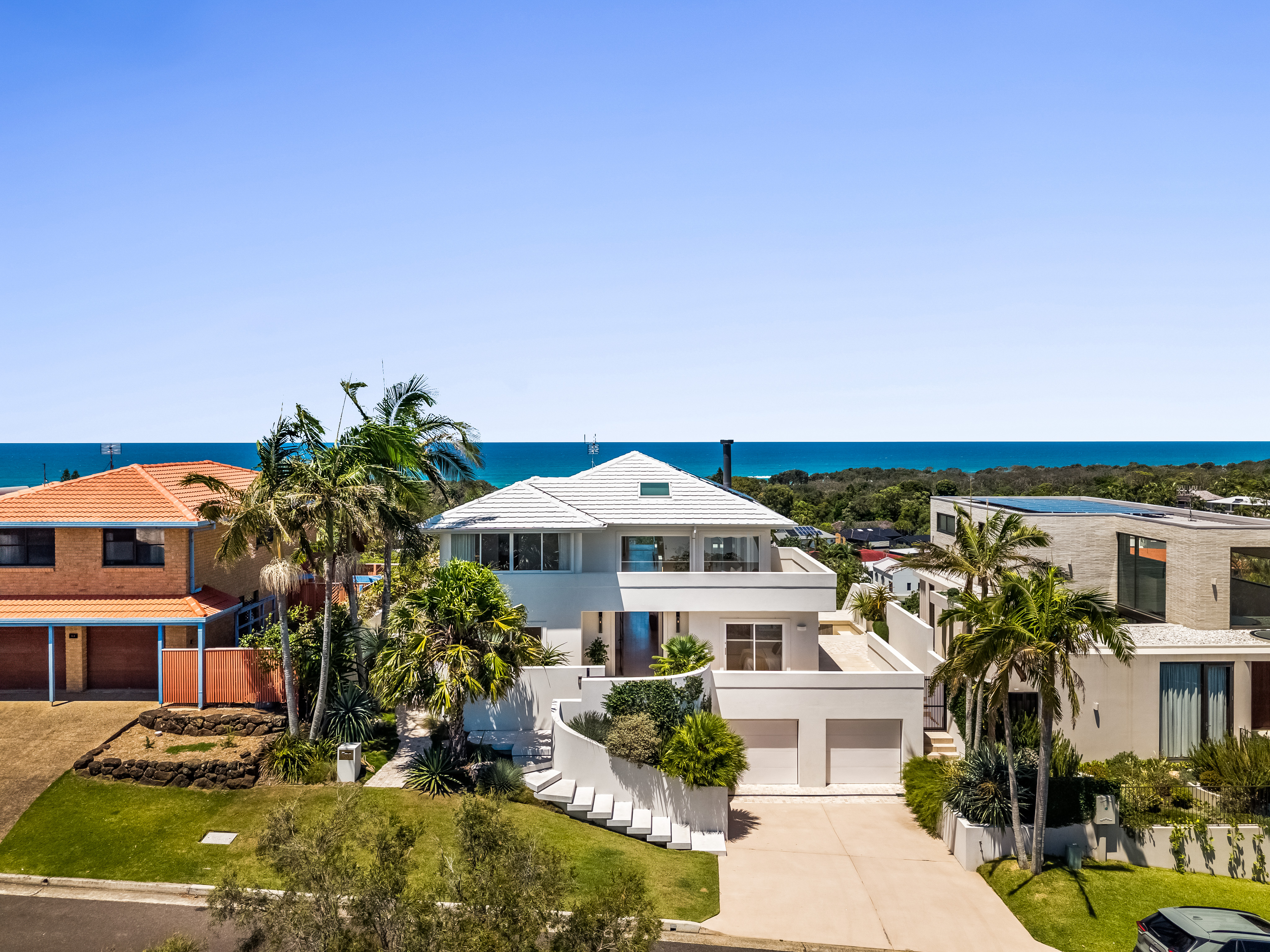 Aerial drone photography showing 20 Pacific Vista Drive and ocean views — real estate photographer Byron Bay