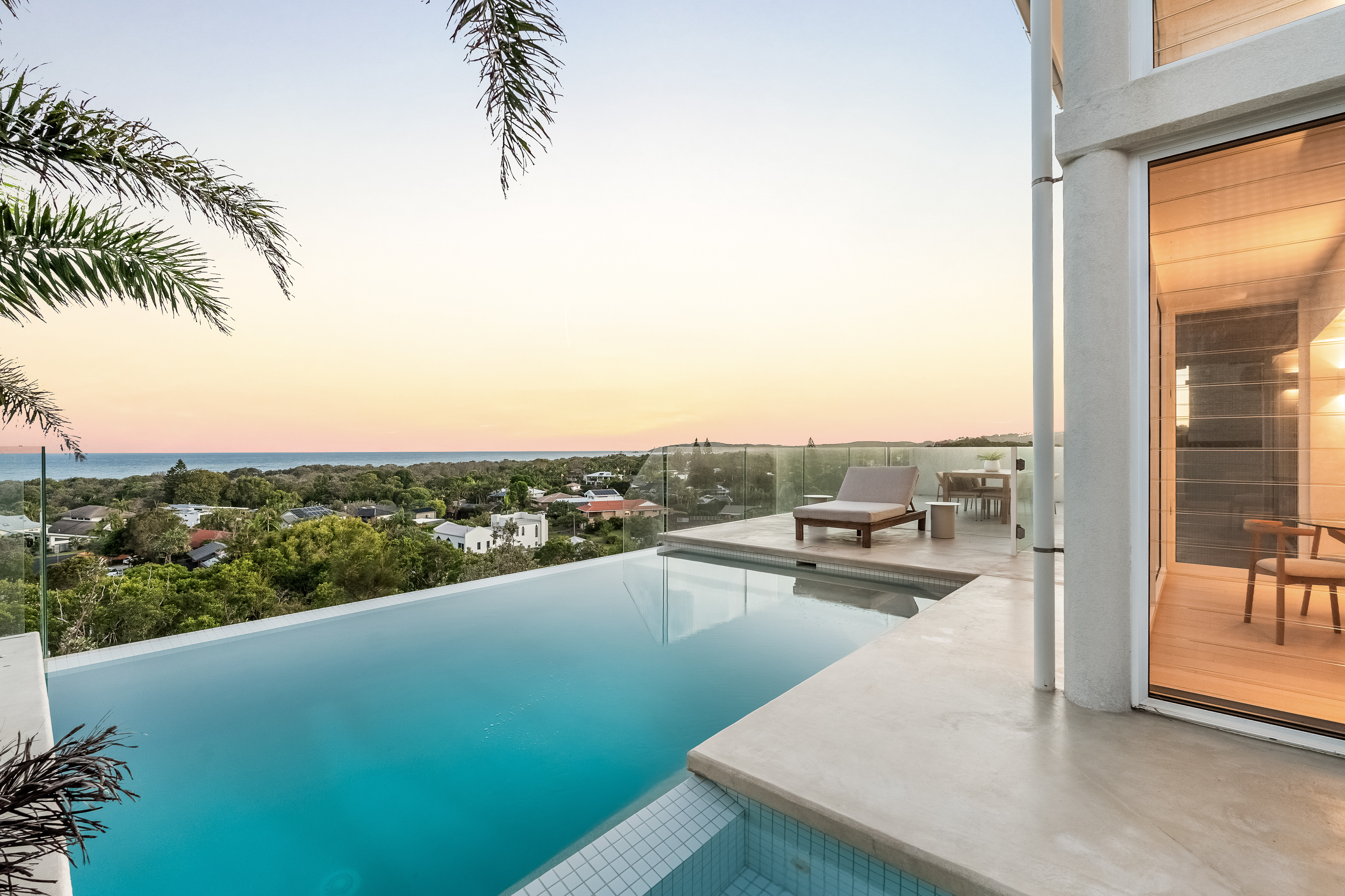 Daytime pool and ocean views — professional real estate and Airbnb photography Byron Bay