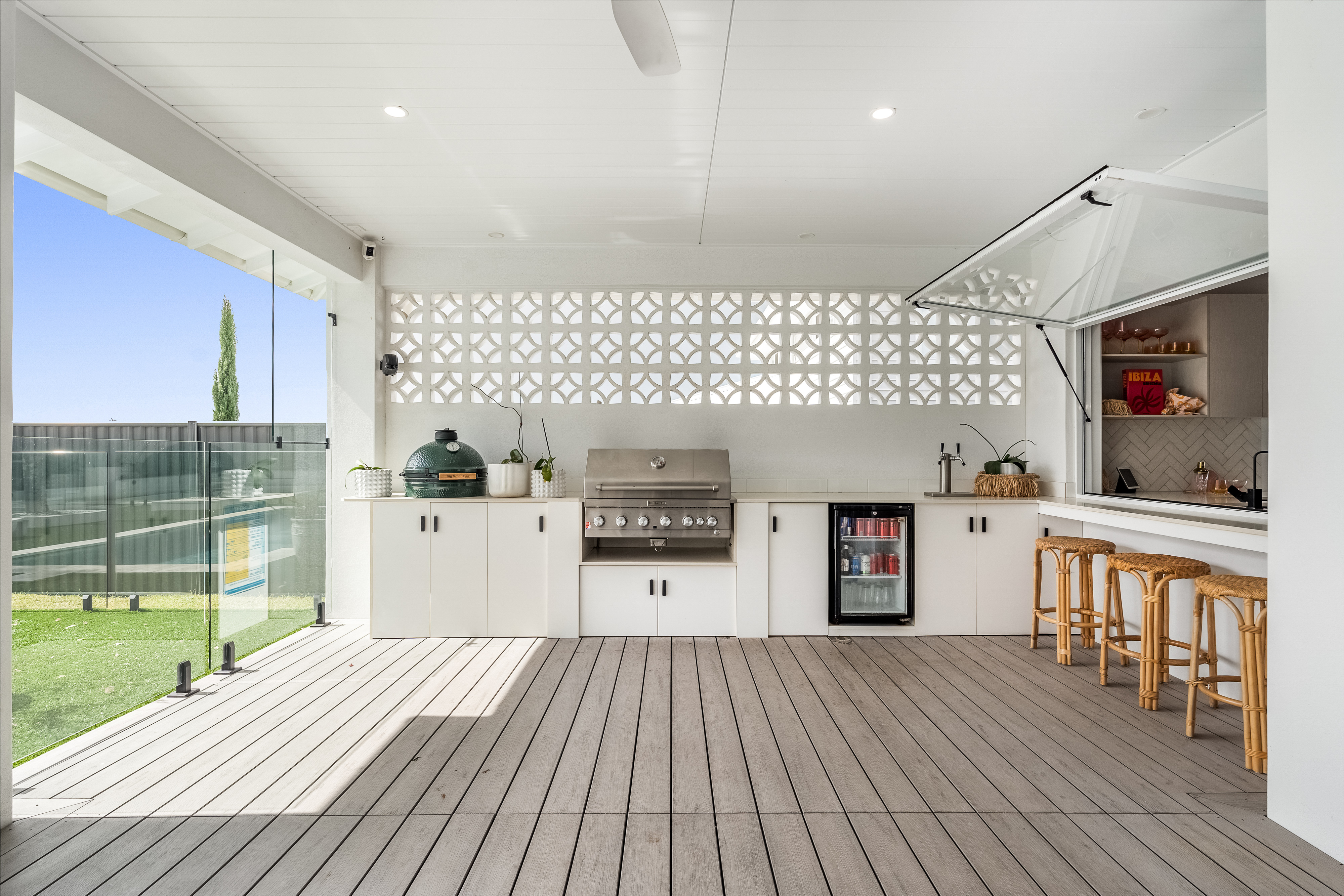Outdoor kitchen with breeze-block feature wall — property photography Ballina