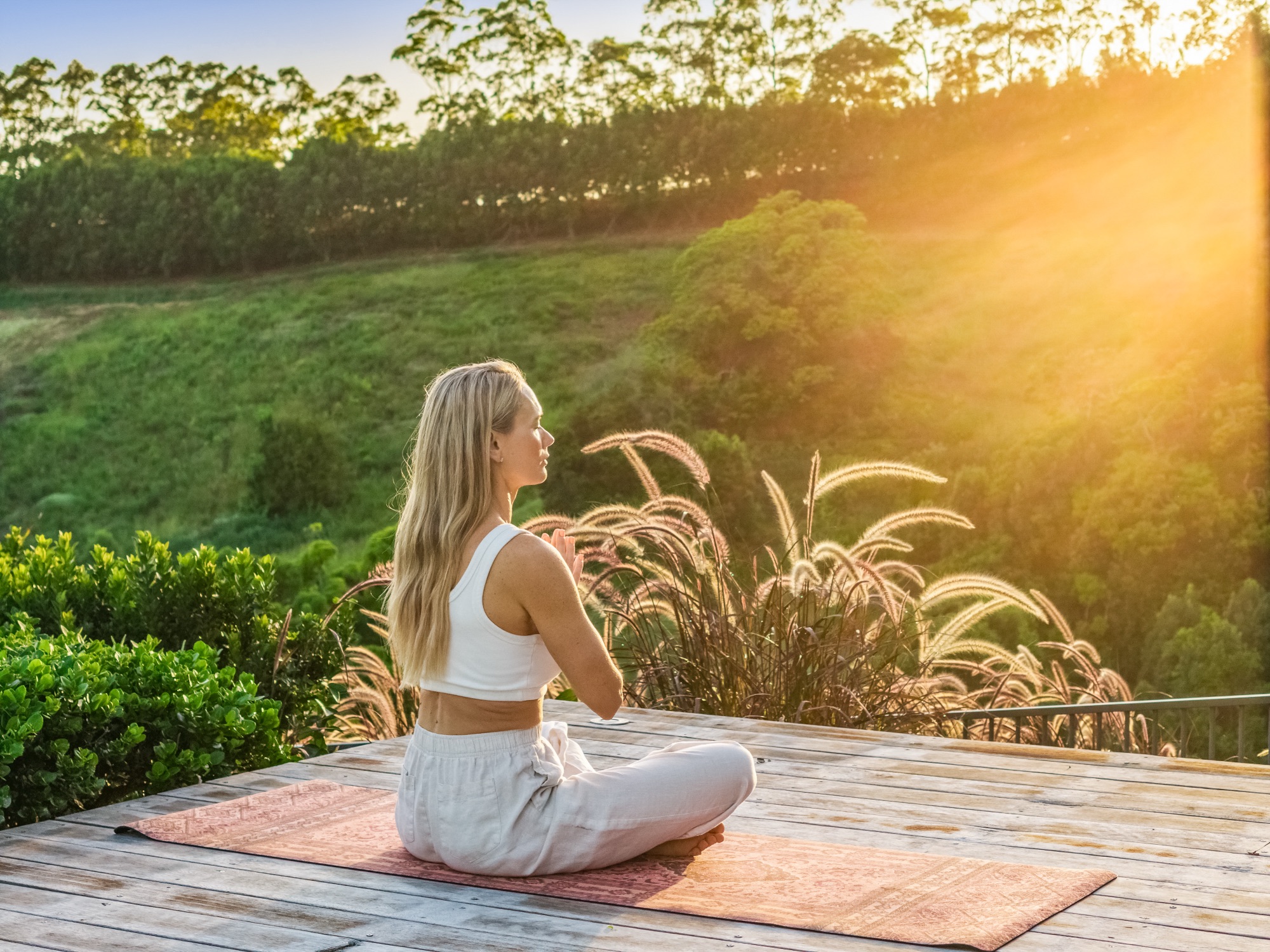 Sunrise meditation with hinterland backdrop